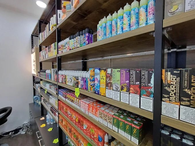 Espositori con liquidi in formato grande e confezioni di aromi